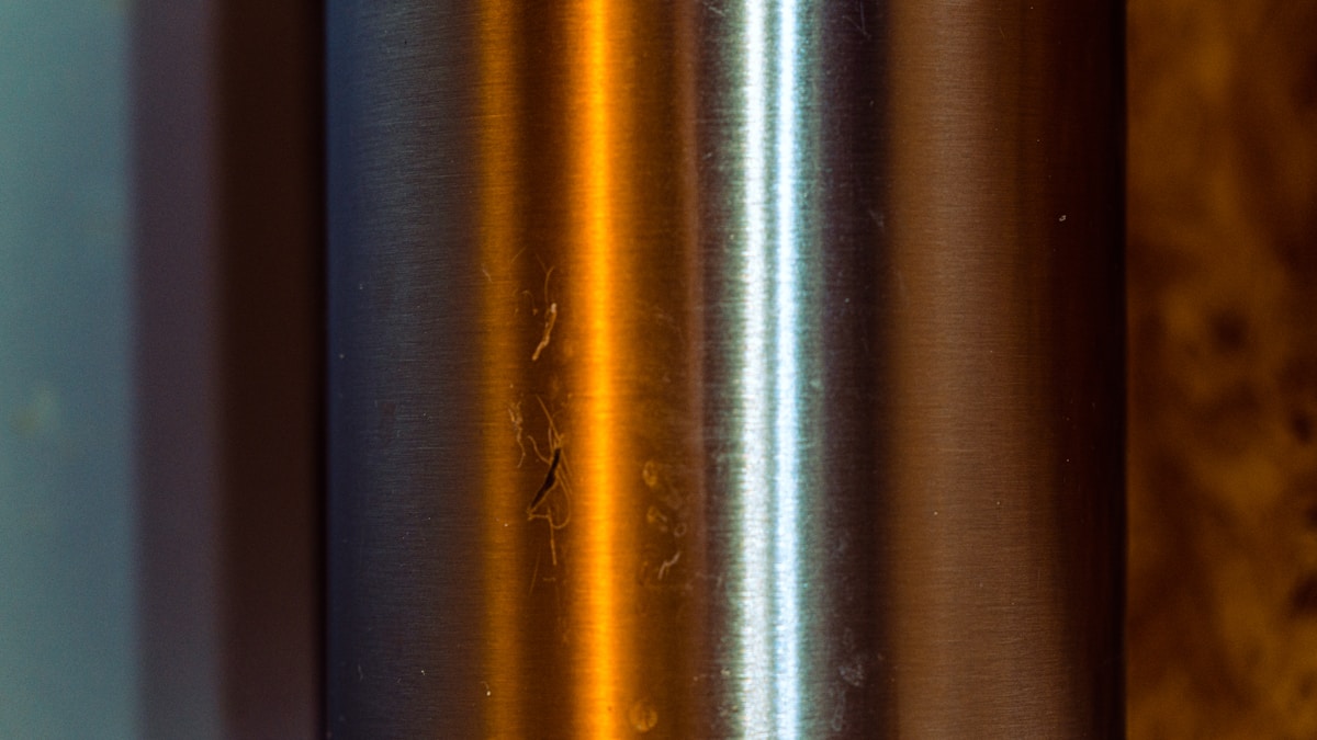 a close up of a metal object on a wall