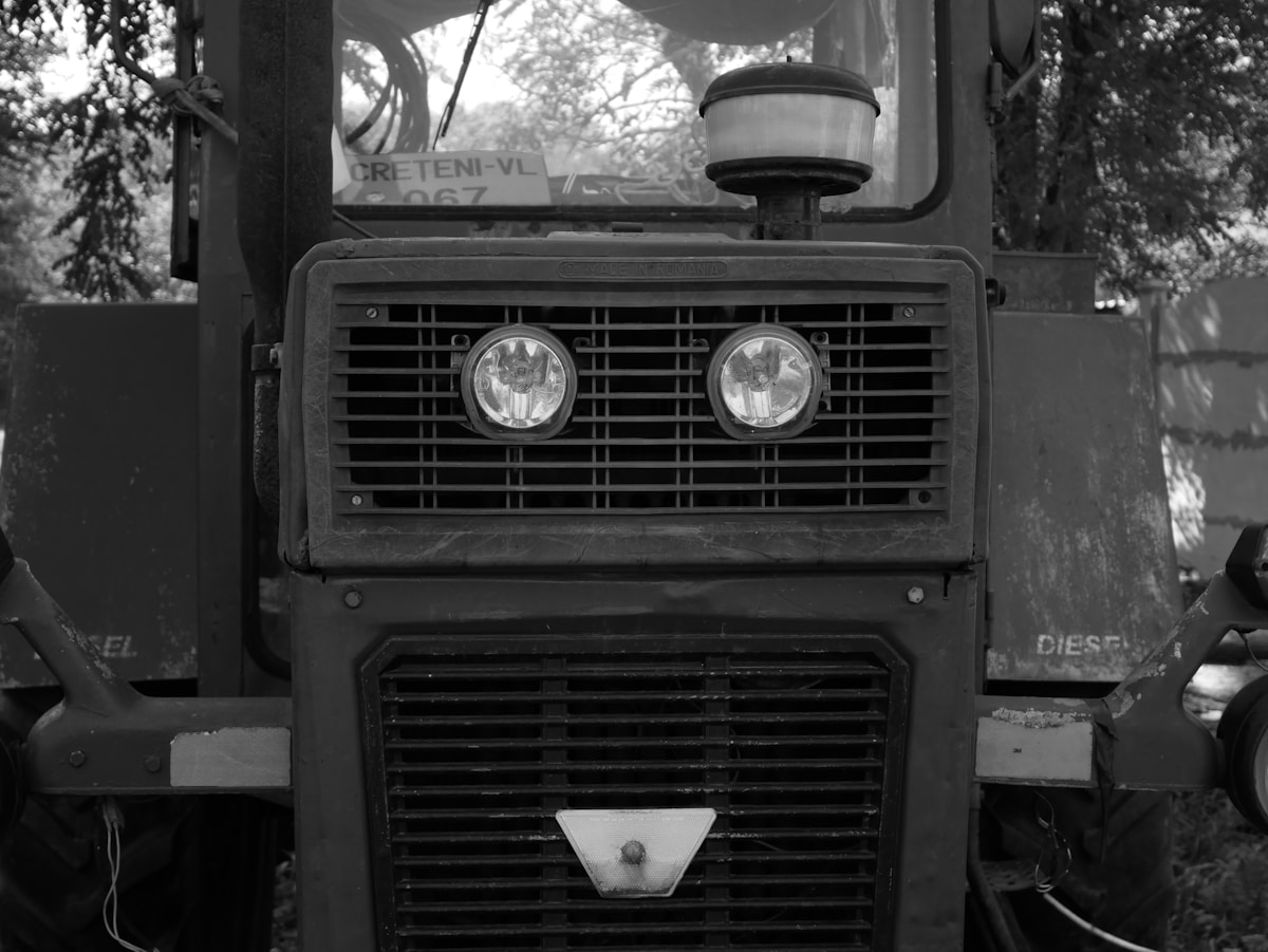 a black and white photo of an old truck
